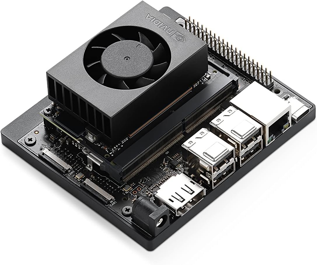 NVIDIA Jetson Orin Nano Super Developer Kit board with active cooling fan, M.2 slots, USB ports, Ethernet, DisplayPort, and DC barrel jack.
